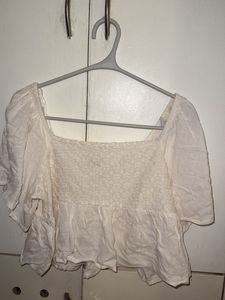 Cream Smocked Peplum Top