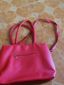 A Beautiful Tomoto Red Hand Bag