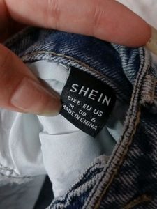 Blue Faded Ripped Denim
