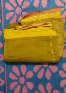Yellow Saree With Golden Design