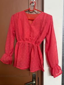 Coral Peplum Top