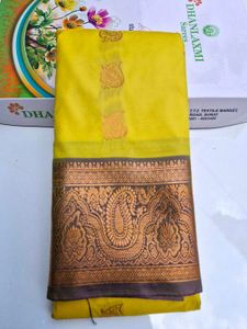 Yellow Silk Saree with Paisley Border