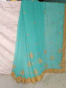 Elegant Aqua Georgette Saree with Zari Work