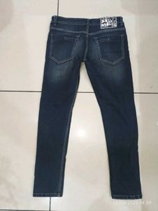 Distressed Denim Jeans