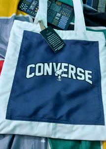 ITS A CONVERSE TOTE BAG. NOT USED EVEN ONCE. NEWLY MANUFACTURED WITH TAG. Tote Bag Contains One Big Blue  Pocket Outside The Bag.