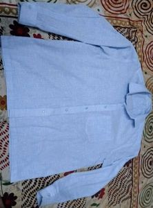 I am selling a formal light blue men's shirt.