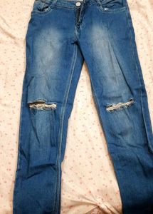 Ripped Knee Jeans