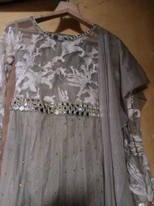 Elegant Grey Embroidered Gown for Festive Occasion