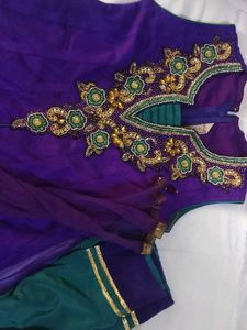 A Suit With Yoke Design