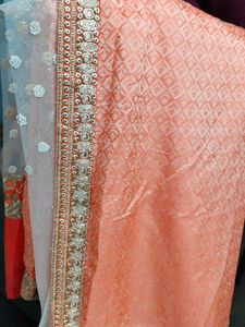 Embroidered silk net saree