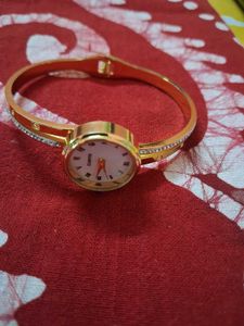 Elegant Gold Bangle Watch