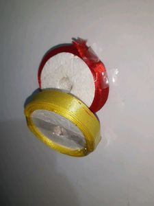 Ribbon on red and yellow colour..