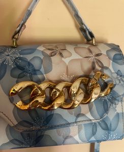 FLORAL PRINT SLING BAG