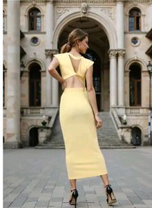 Elegant Yellow Midi Dress with price tag