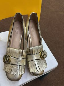 Gucci Gold Heels