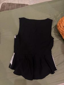 black corset style vest