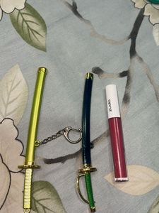 sword keychain. and a zudio lipstick