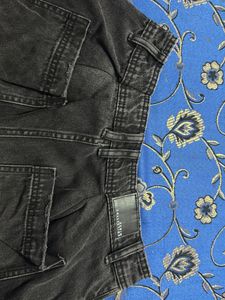 Loose fit distressed denim pant