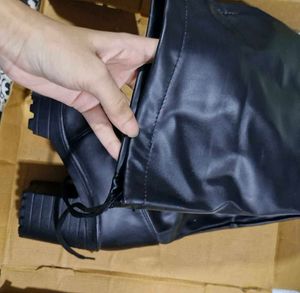 New leather boots knee length