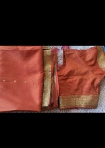 Orange Saree with Gold Border Blouse