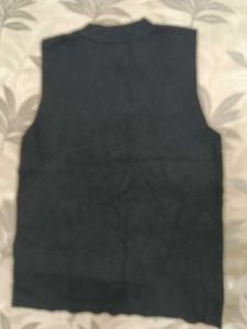Black Ribbed Sleeveless Tank With Turtle neck