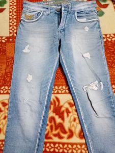 Distressed Denim Jeans