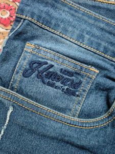 Ripped Blue Denim Jeans