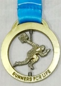Collectible PUMA Urban Stampede Finisher Medal.