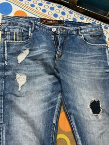 Ripped Wash Jeans