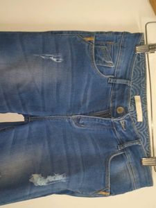 Distressed Denim Jeans
