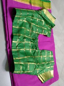 Pink &amp; green saree with stiched blouse.