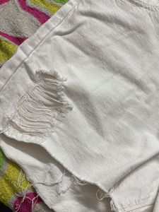 A white ribbed denim short