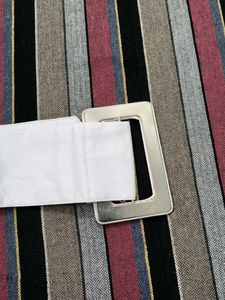 This is a very beautiful white colored cloth belt