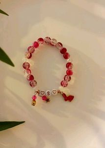 Two Bracelets And One Earrings