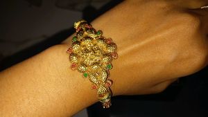 Stunning Gold-Tone Lion Bangle