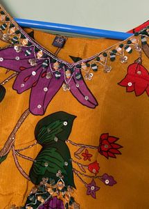 NAIRA CUT KURTI WITH WIDE LEG PLAZO PANT