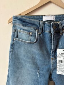 Distressed Denim Jeans