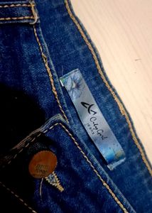 Ripped Flared Leg Jeans