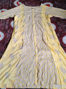 Beautiful Yellow Printed Kurti in Good Condition