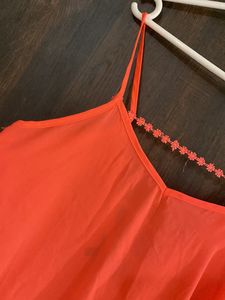Coral Tank Top with Ruffle Detail