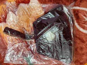 Charlotte Tillbury Potli.