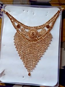 Golden Stone Necklace with ear rings and mangtika