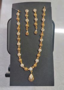 Beautiful Golden Necklace And Earrings Set