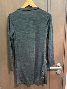Breezy and effortlessly stylish, this black top wi