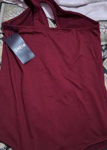 One-Shoulder bodysuit with tag.