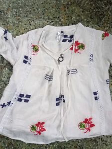 A White Prinred Top With Beautiful Sleeves
