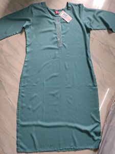 Mild Green Kurthi With Beautiful Work