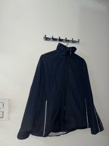 Navy Windbreaker Jacket With White Strips On Arms