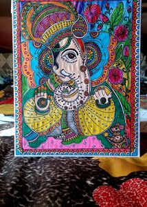Homemade Lord Ganesha. Madhubhani Painting. Water,
