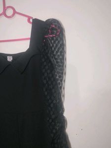 WomenMid Length Frock With Netted Puff Hand Sleeve